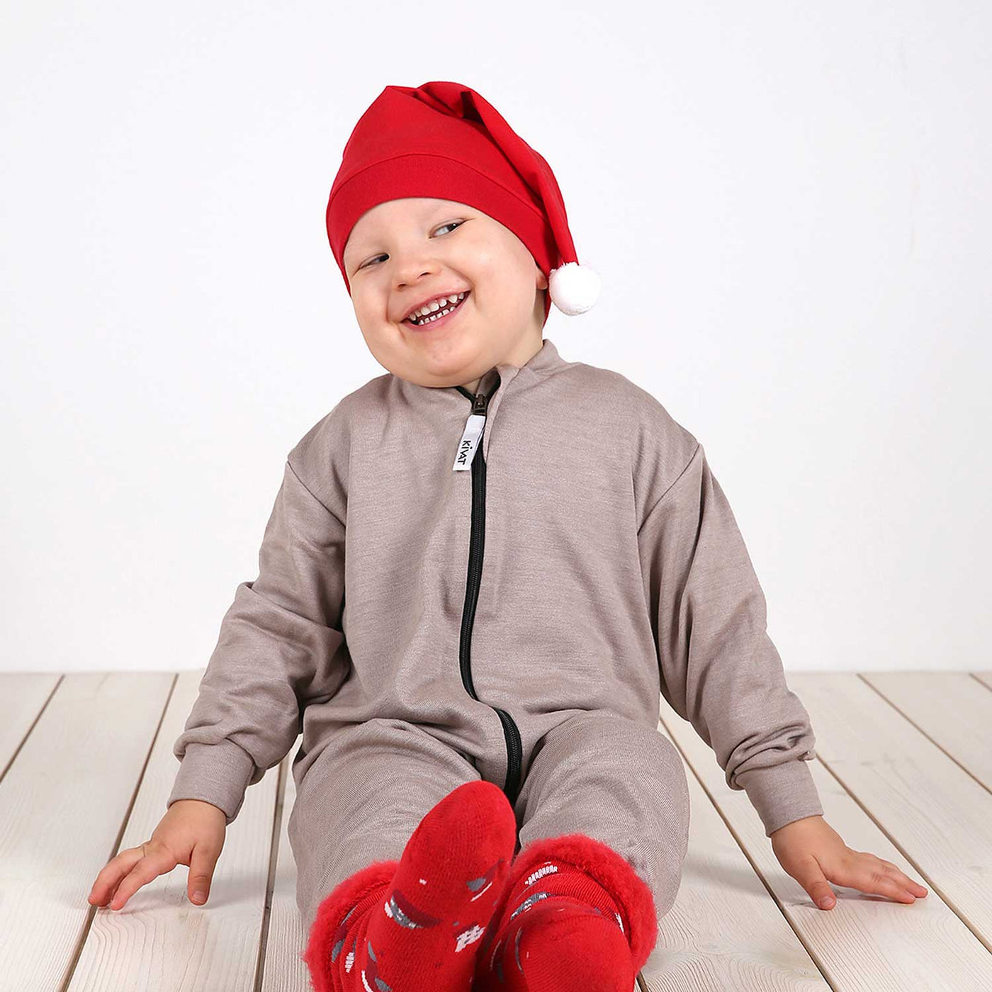 KIVAT tonttulakki lapsen päässä